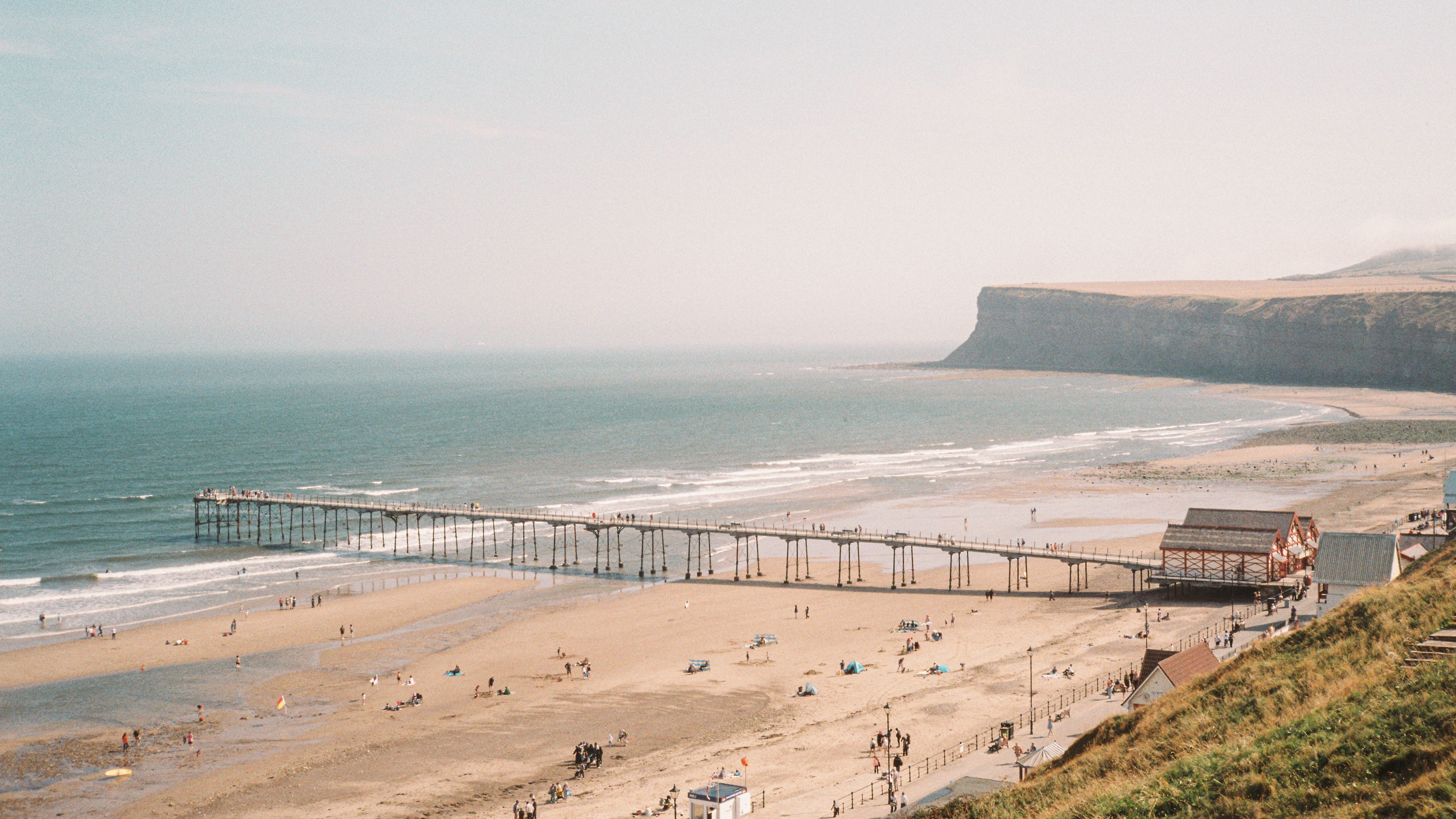 Saltburn pier and beach, with Huntcliff in the distance